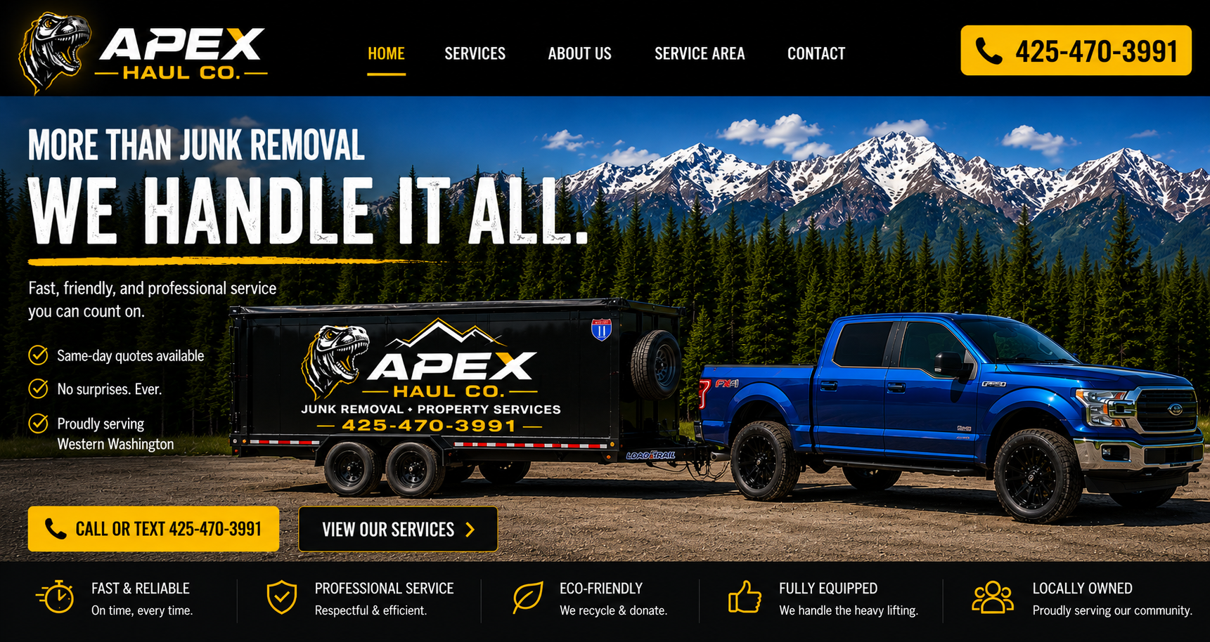 Apex Haul Co. blue truck and branded trailer in Western Washington mountains